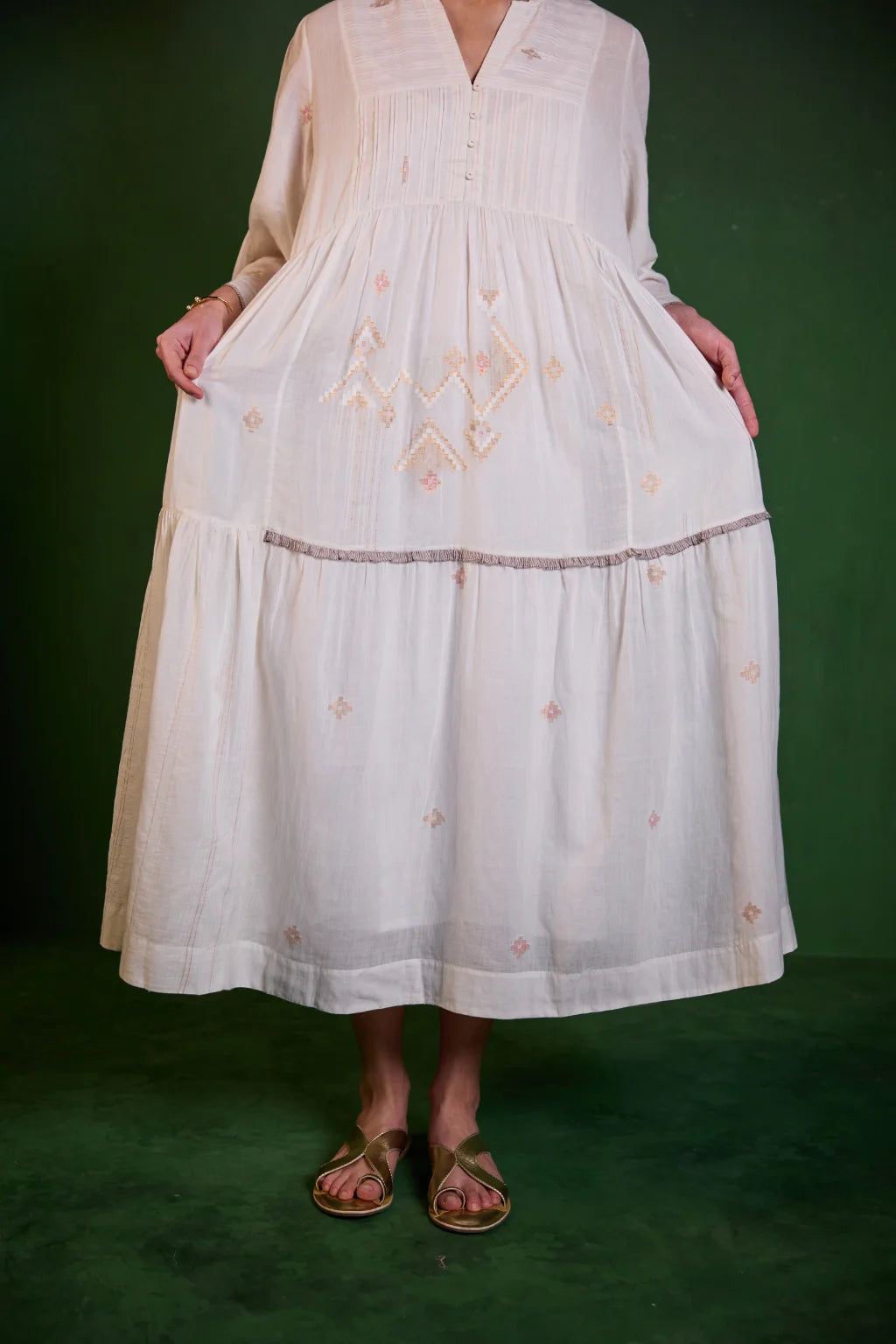 Sarron Shubhra Dress, ivory white silk-cotton Jamdani dress with ghicha zari motifs and a tiered cut.