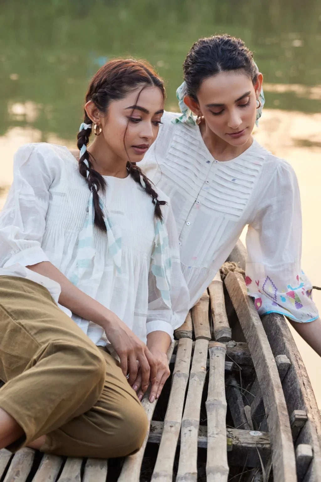 Sarron Sneha Dress, white cotton Jamdani dress with a pleated fall, round neck and waist smocking.