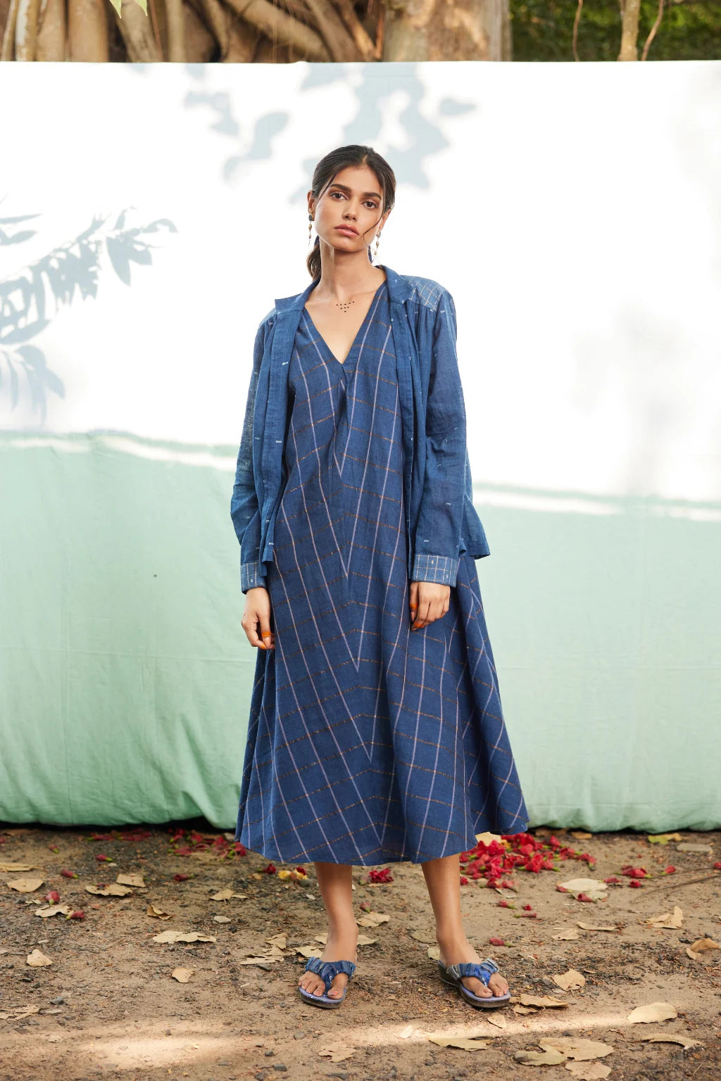 Sarron Tarang Set, indigo blue cotton Jamdani sleeveless dress with a zari-check jacket overlay.