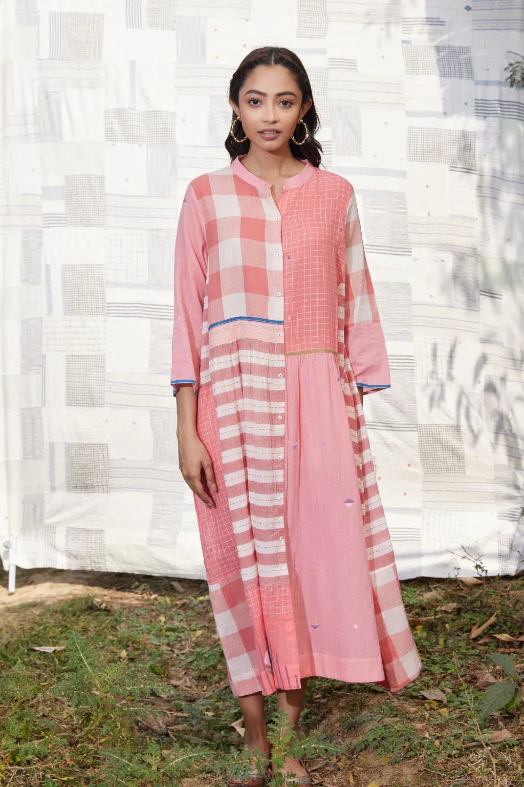 Sarron Tarini Dress, pink cotton Jamdani dress with stripes, checks and handwoven Jamdani motifs.