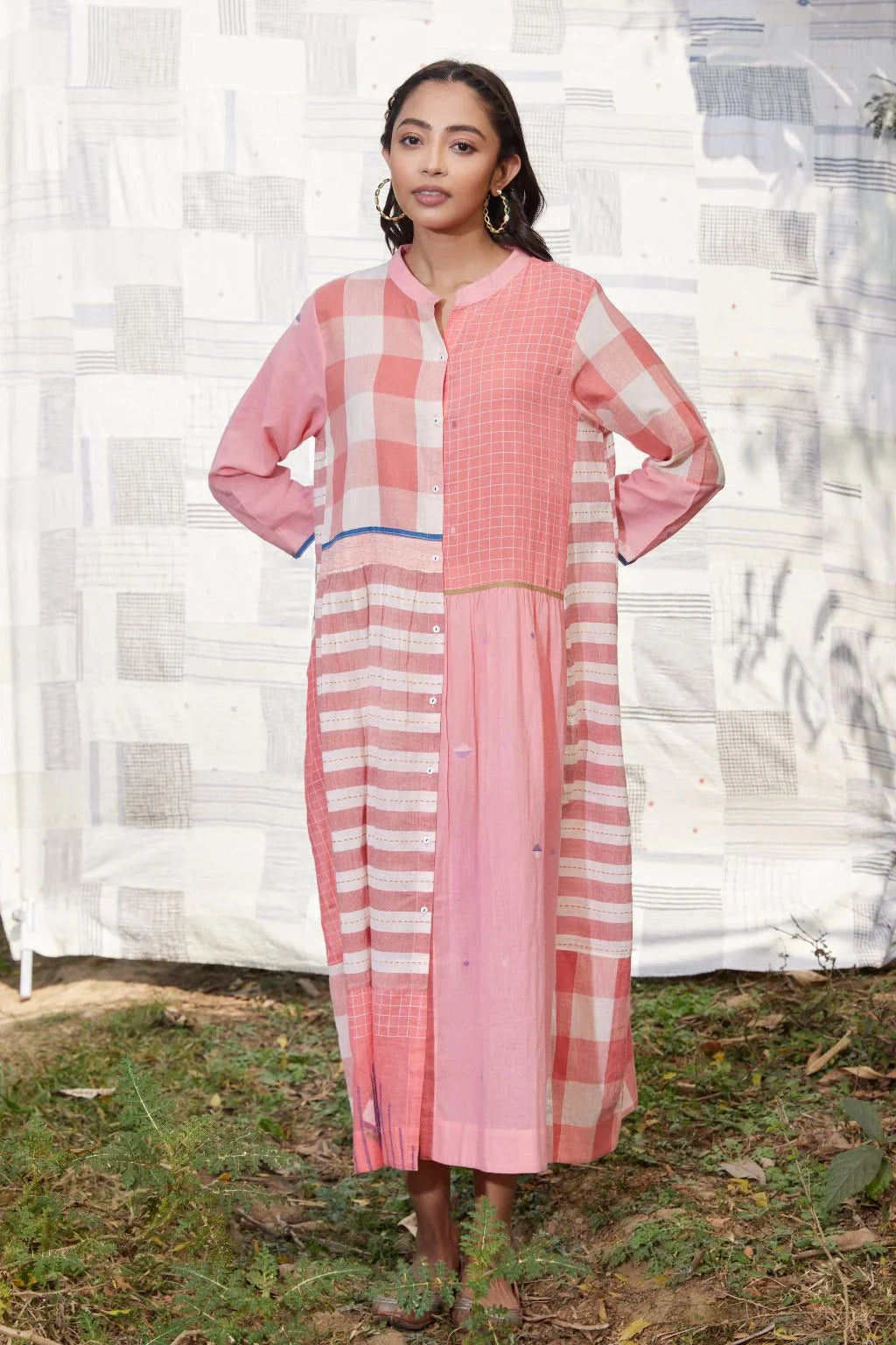 Sarron Tarini Dress, pink cotton Jamdani dress with stripes, checks and handwoven Jamdani motifs.