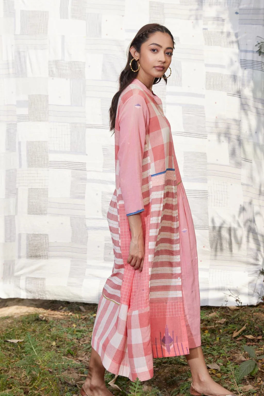Sarron Tarini Dress, pink cotton Jamdani dress with stripes, checks and handwoven Jamdani motifs.