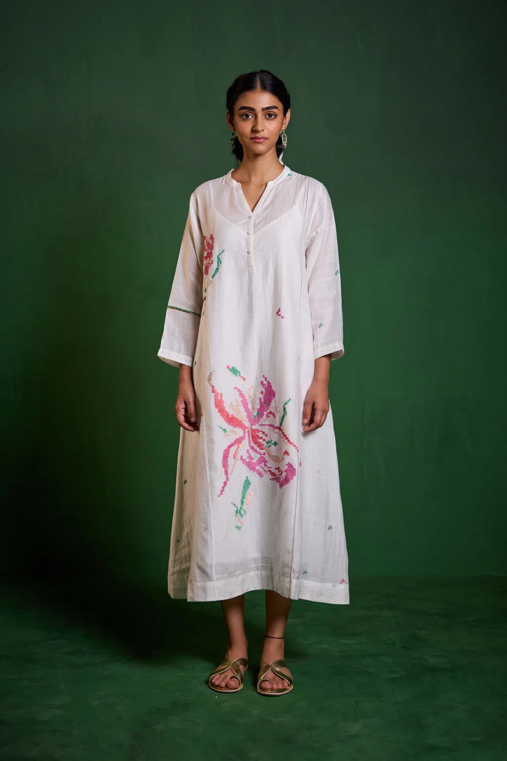 Sarron Uma Dress, white silk-cotton Jamdani dress with large floral graph motifs and a split neckline.