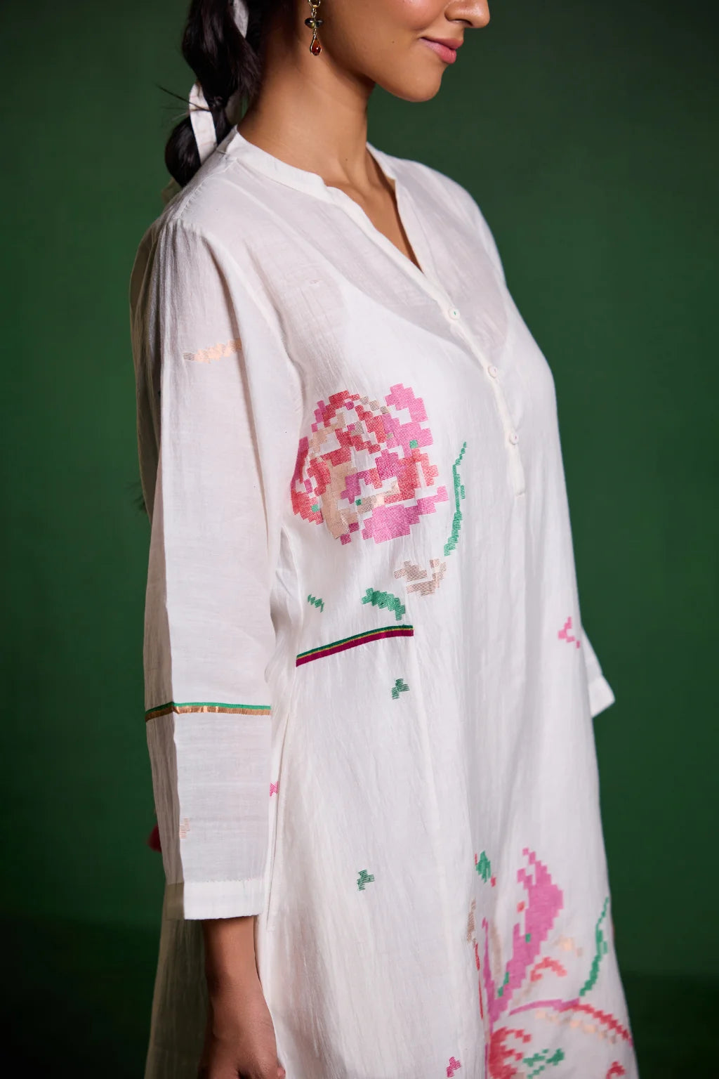Sarron Uma Dress, white silk-cotton Jamdani dress with large floral graph motifs and a split neckline.