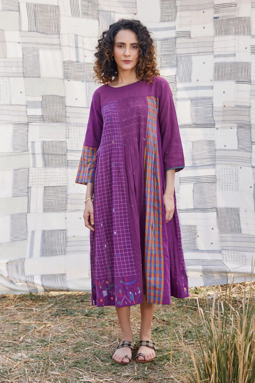 Sarron Vanya Dress, red cotton Jamdani dress with contrasting handwoven patterns and a hem motif.