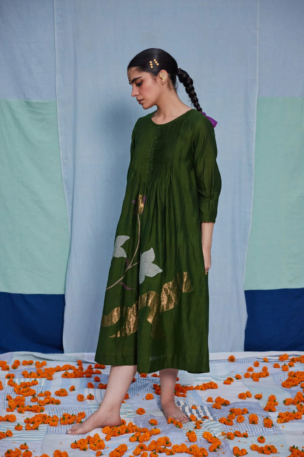 Sarron Vrinda Dress, dark olive silk-cotton Jamdani dress with a large floral placement buta.