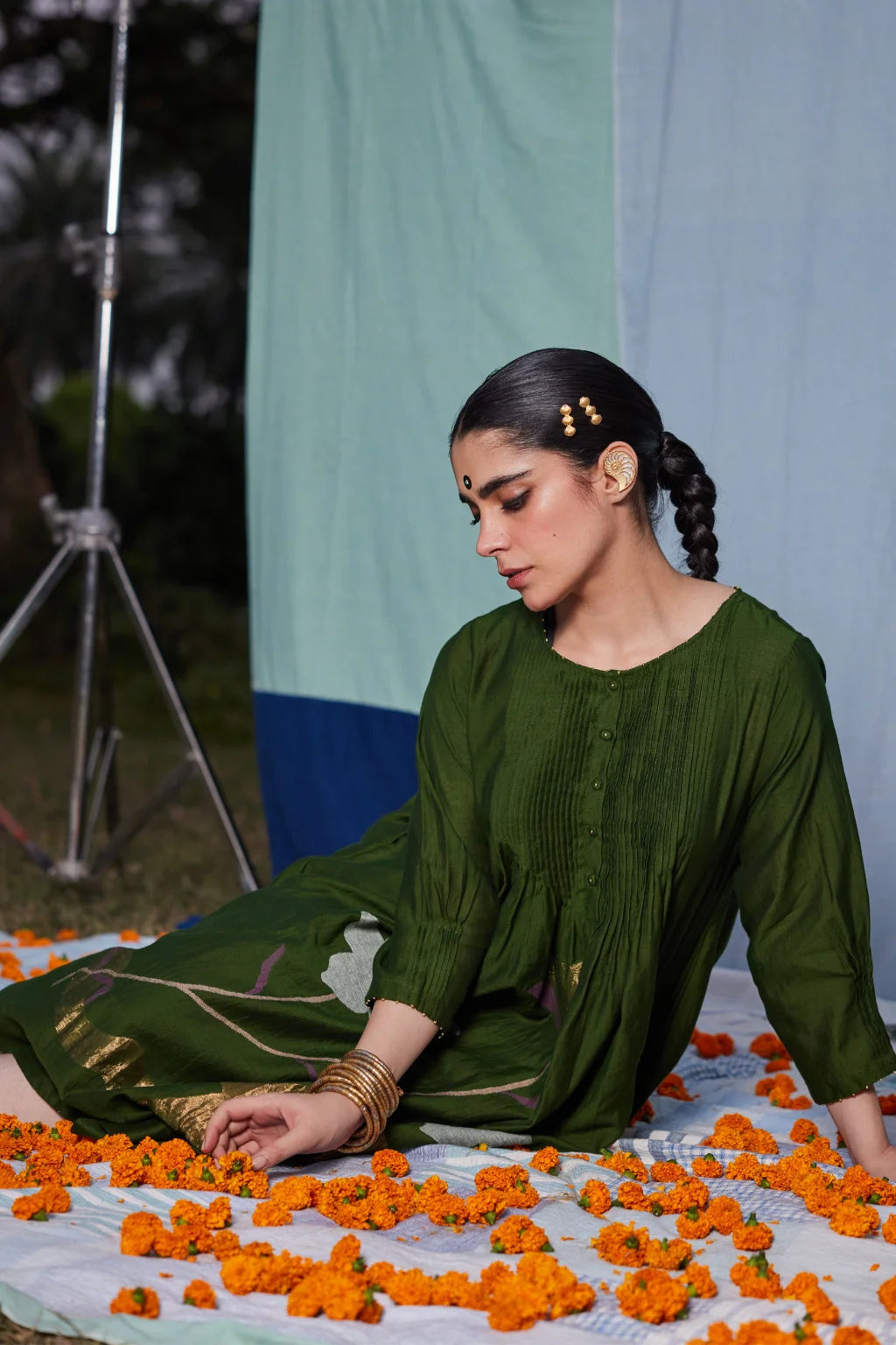 Sarron Vrinda Dress, dark olive silk-cotton Jamdani dress with a large floral placement buta.