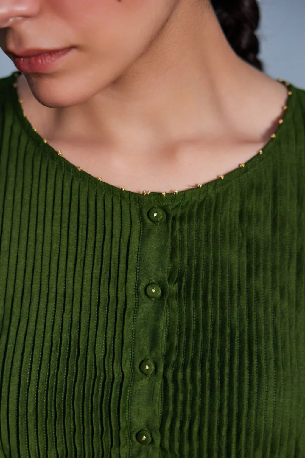 Sarron Vrinda Dress, dark olive silk-cotton Jamdani dress with a large floral placement buta.